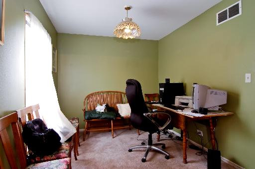 2084 Sutherland Place Hoffman Estates, IL 60169 - Photo 5 of 9 a workspace with furniture and a window