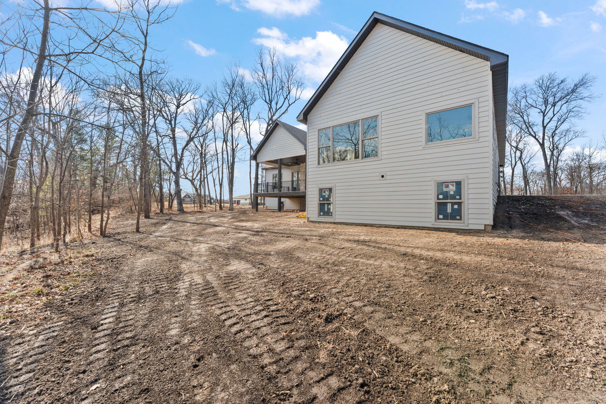 16669 Noble Street Lowell, IN 46356 - Photo 54 of 55 a view of a house with a yard