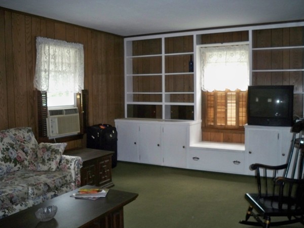 69 Kingsley Street Springfield, MA 01104 - Photo 3 of 20 a living room with furniture and a window