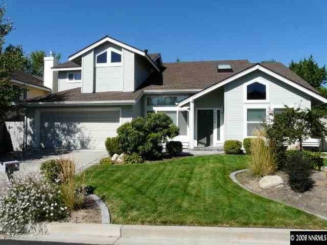6245 Alpine Meadows Road Reno, NV 89519 - Photo 1 of 7 a front view of a house with a yard