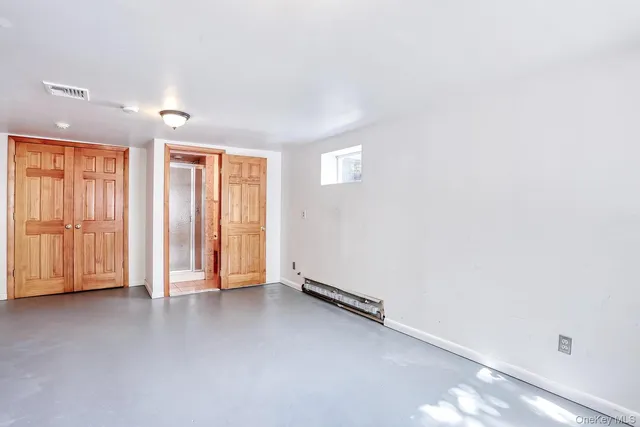 an empty room with windows