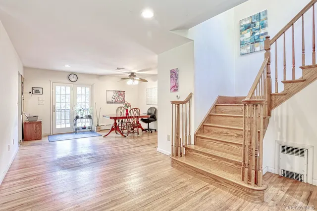 a view of a livingroom with furniture and wooden floor