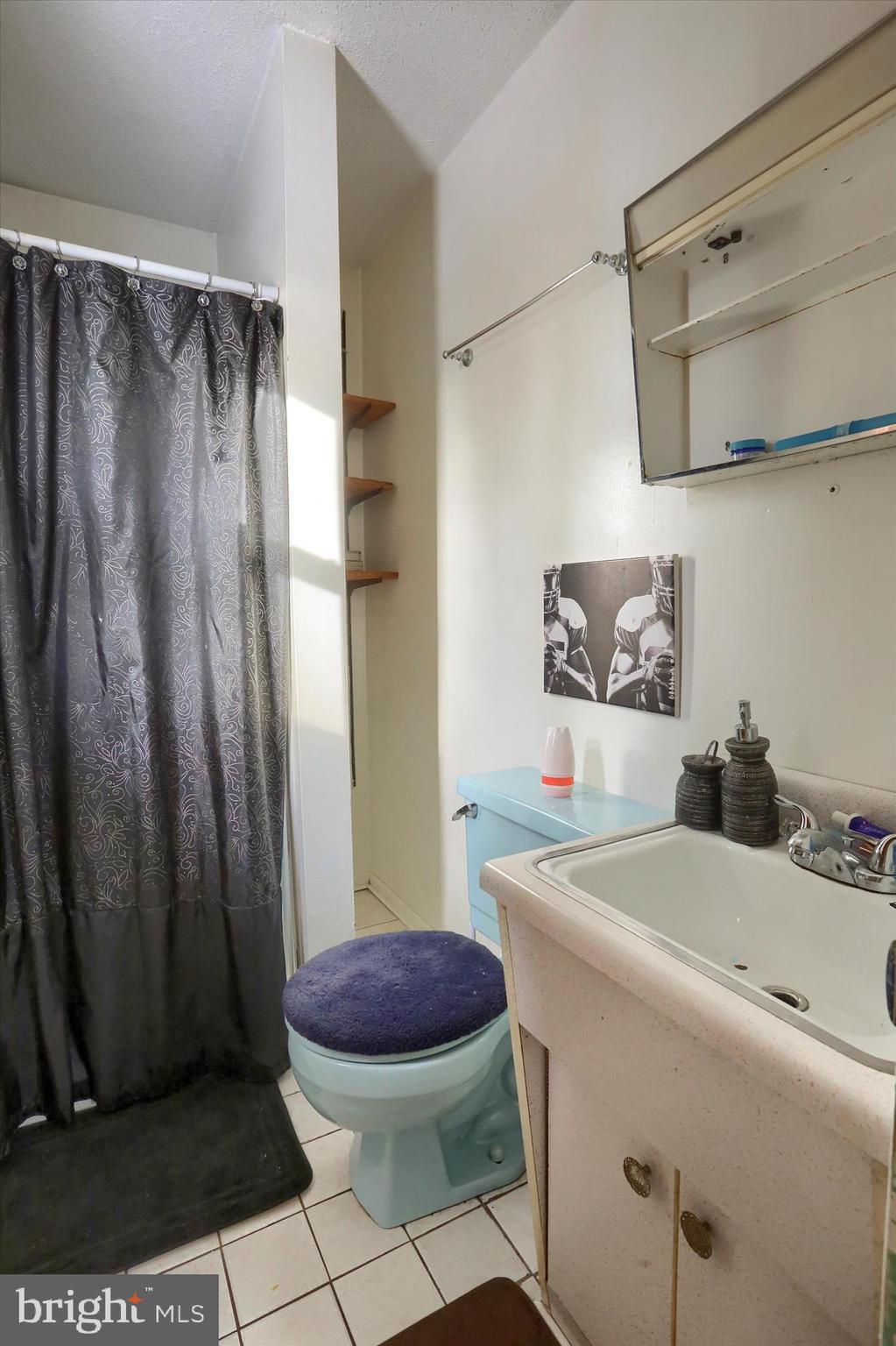 2337 Thornton Road Harrisburg, PA 17109 - Photo 21 of 34 a bathroom with a sink toilet and shower