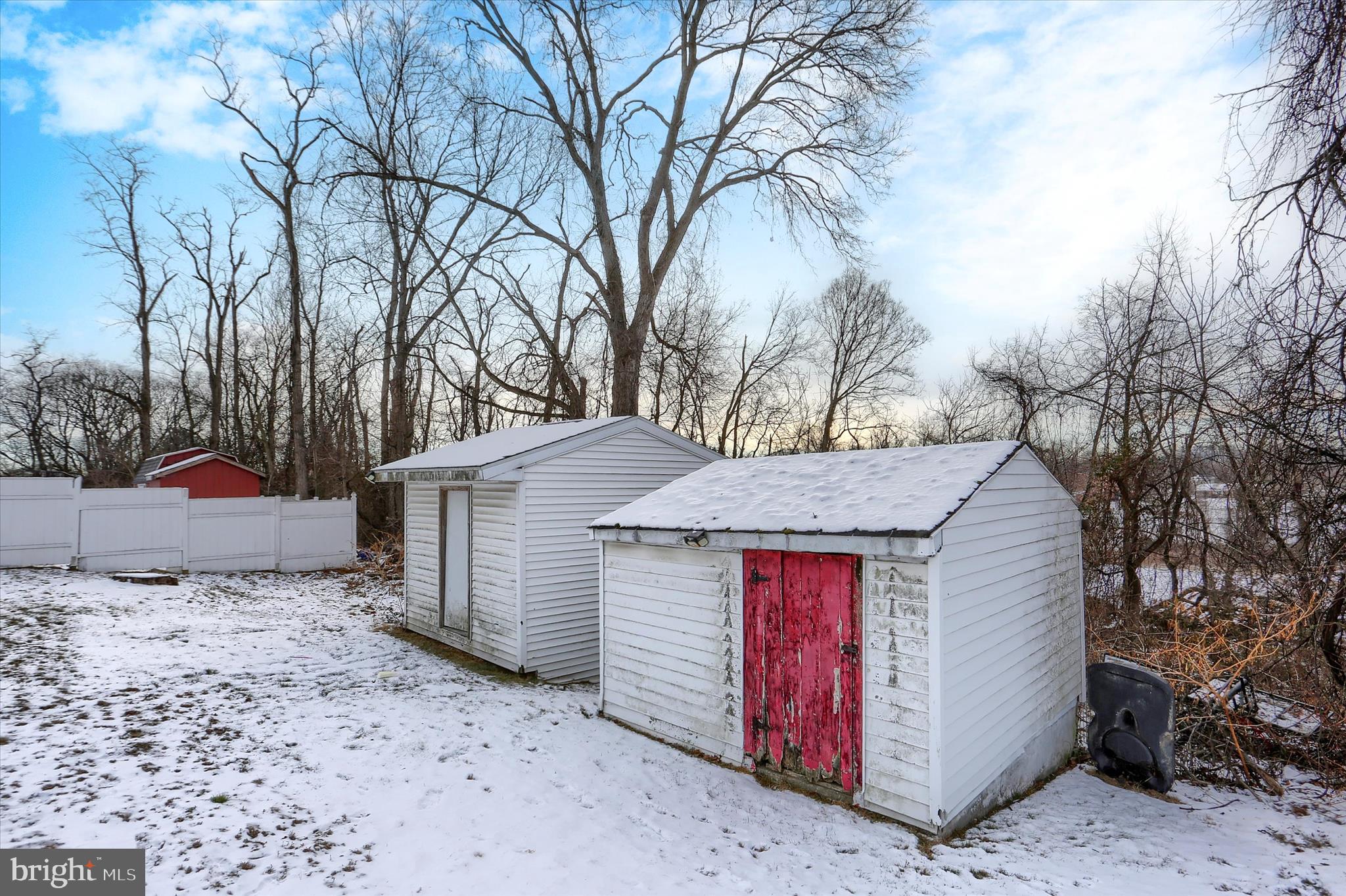 2337 Thornton Road Harrisburg, PA 17109 - Photo 34 of 34 a view of a white house with a large tree