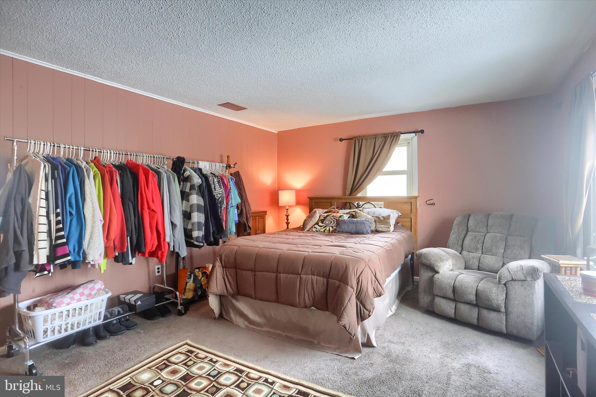 2337 Thornton Road Harrisburg, PA 17109 - Photo 4 of 34 a bedroom with a bed and a couch