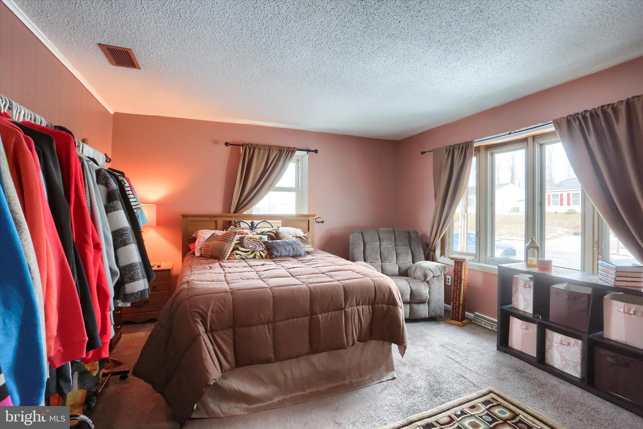 2337 Thornton Road Harrisburg, PA 17109 - Photo 6 of 34 a bedroom with a bed and a large window