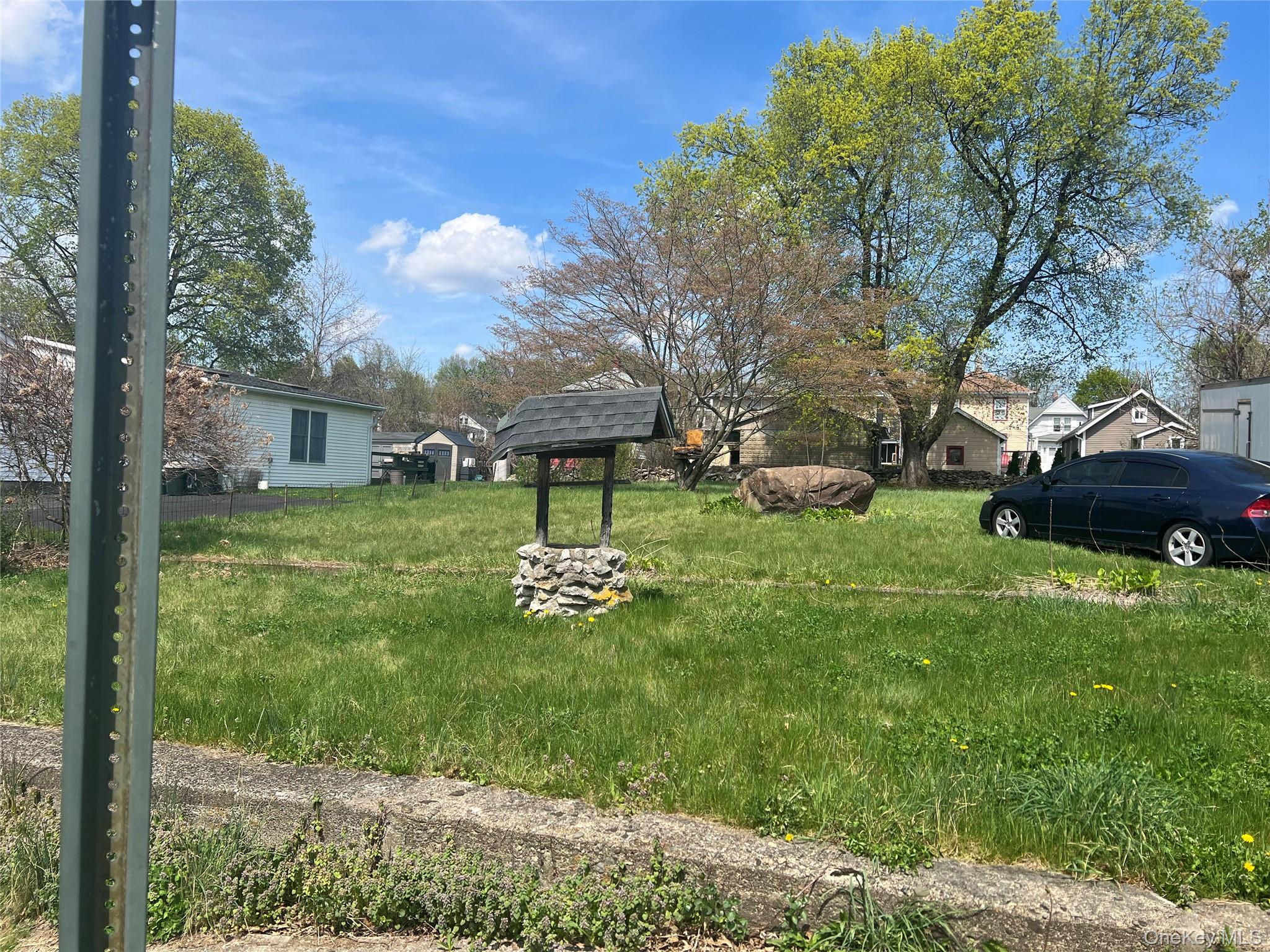 88 Maple Street Newburgh, NY 12550 - Photo 3 of 4 a view of a house with a yard