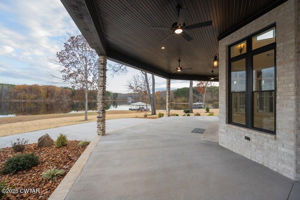 425 Shoreview Lane Huntingdon, TN 38344 - Photo 15 of 65 a swimming pool with outdoor seating and yard in the back