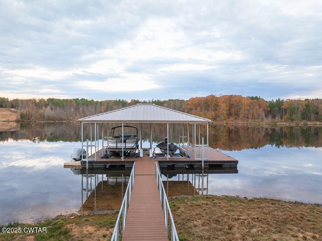 425 Shoreview Lane Huntingdon, TN 38344 - Photo 17 of 65 a view of a lake with a table and chairs