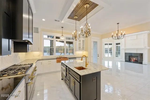 a spacious bathroom with a tub shower and sink