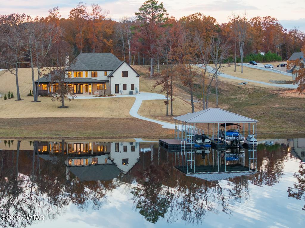 425 Shoreview Lane Huntingdon, TN 38344 - Photo 5 of 65 a view of a house with pool and chairs