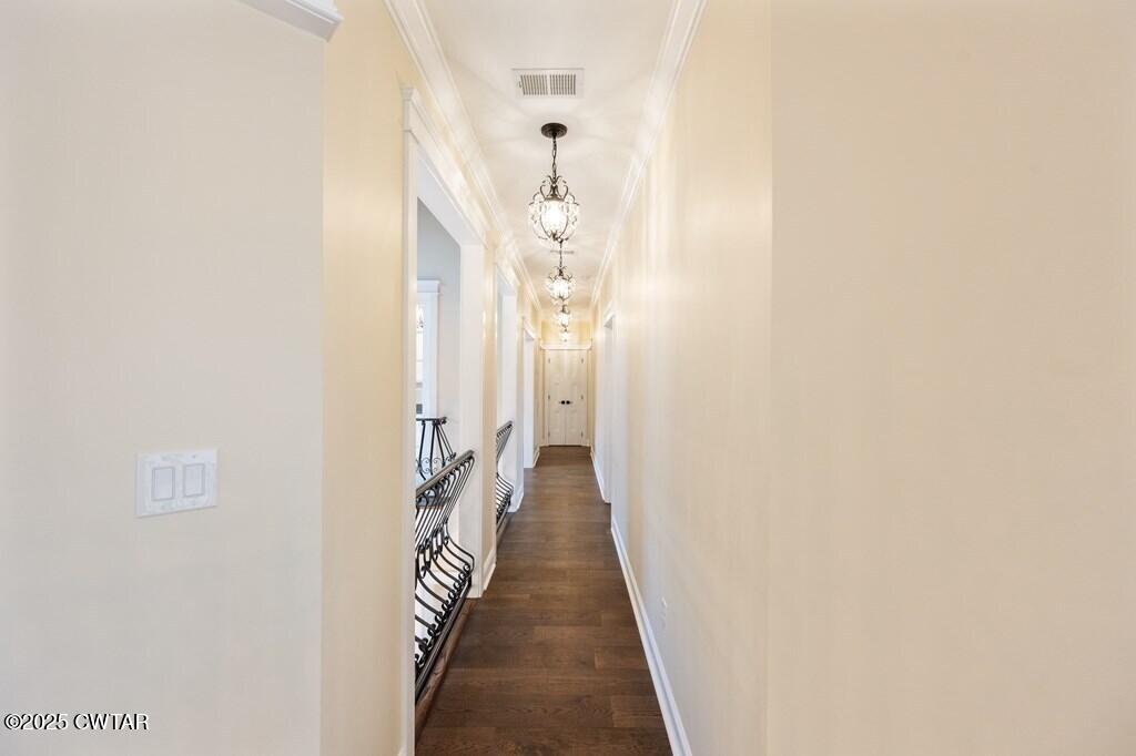 425 Shoreview Lane Huntingdon, TN 38344 - Photo 52 of 65 a view of a hallway with wooden floor
