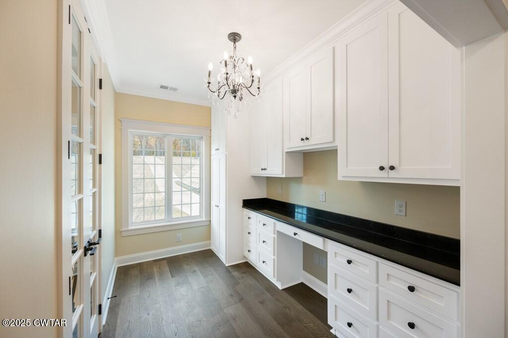 425 Shoreview Lane Huntingdon, TN 38344 - Photo 54 of 65 a kitchen with granite countertop white cabinets and sink