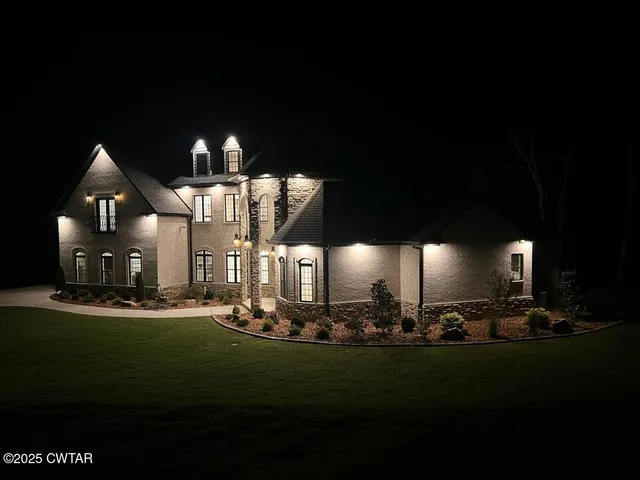 a front view of a house with swimming pool