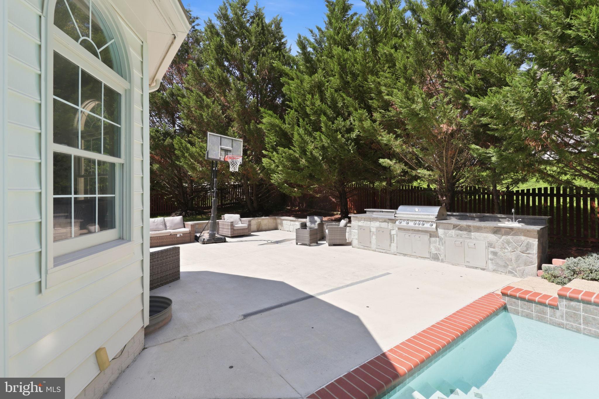 18426 Rim Rock Circle Leesburg, VA 20176 - Photo 56 of 60 Sunny outdoor retreat with grill area.