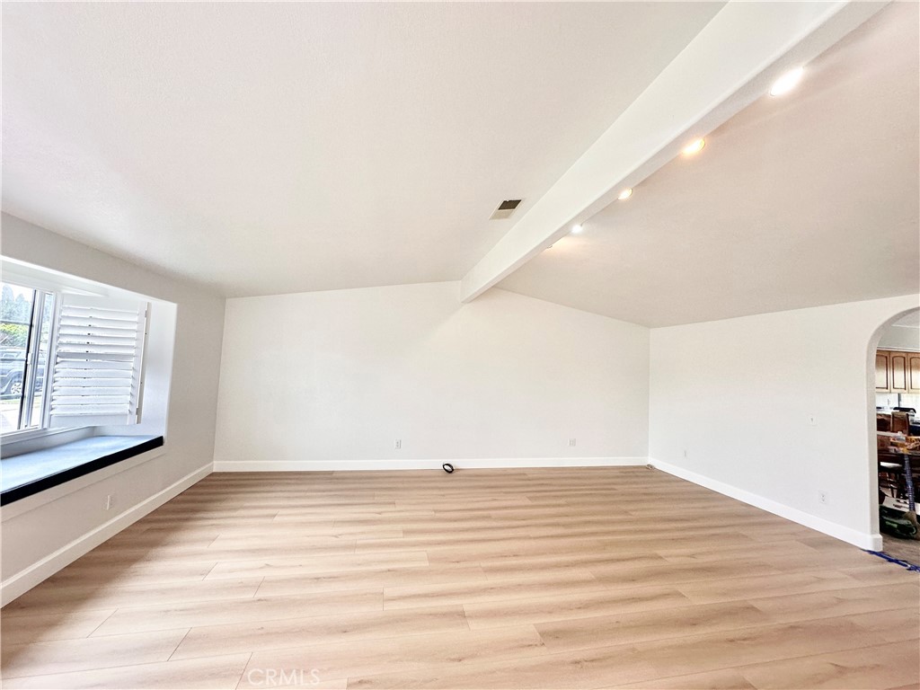 14132 Roxanne Drive Westminster, CA 92683 - Photo 13 of 36 a view of a room with wooden floor and window