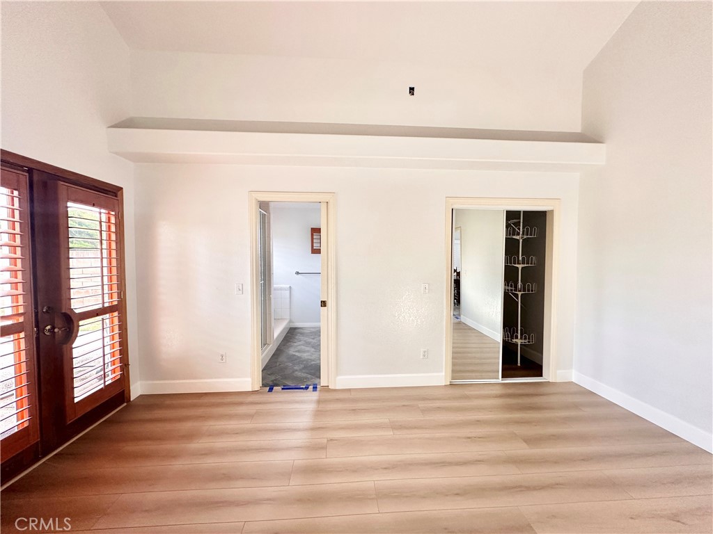 14132 Roxanne Drive Westminster, CA 92683 - Photo 27 of 36 a view of a livingroom with wooden floor and window