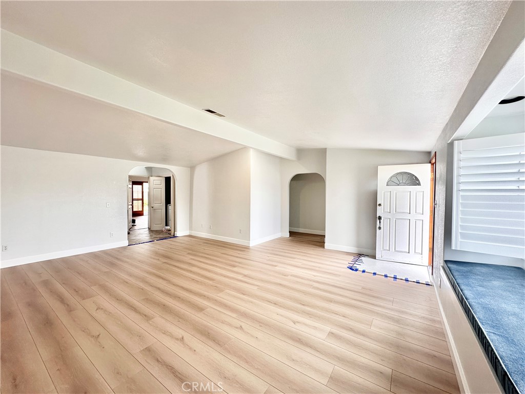 14132 Roxanne Drive Westminster, CA 92683 - Photo 32 of 36 a view of a room with wooden floor and stairs