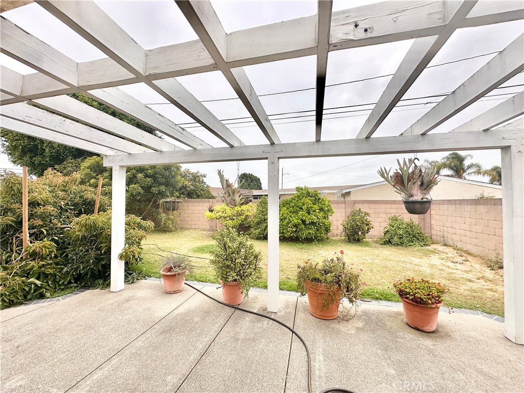14132 Roxanne Drive Westminster, CA 92683 - Photo 35 of 36 a bedroom with furniture and a potted plant