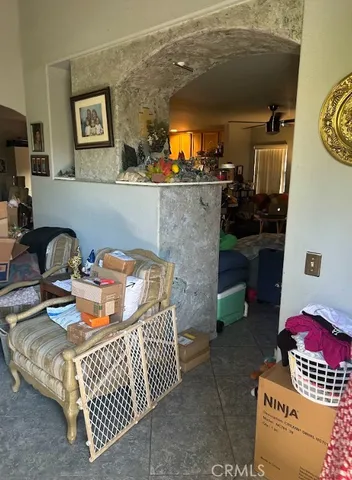 a living room with furniture and a table
