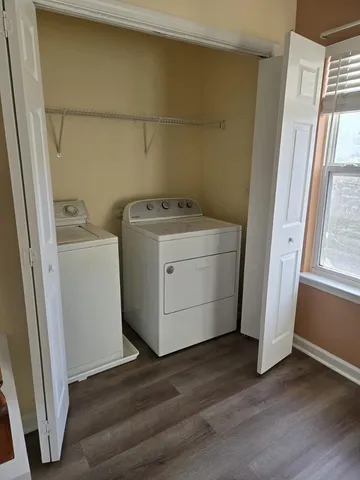 a utility room with dryer and washer