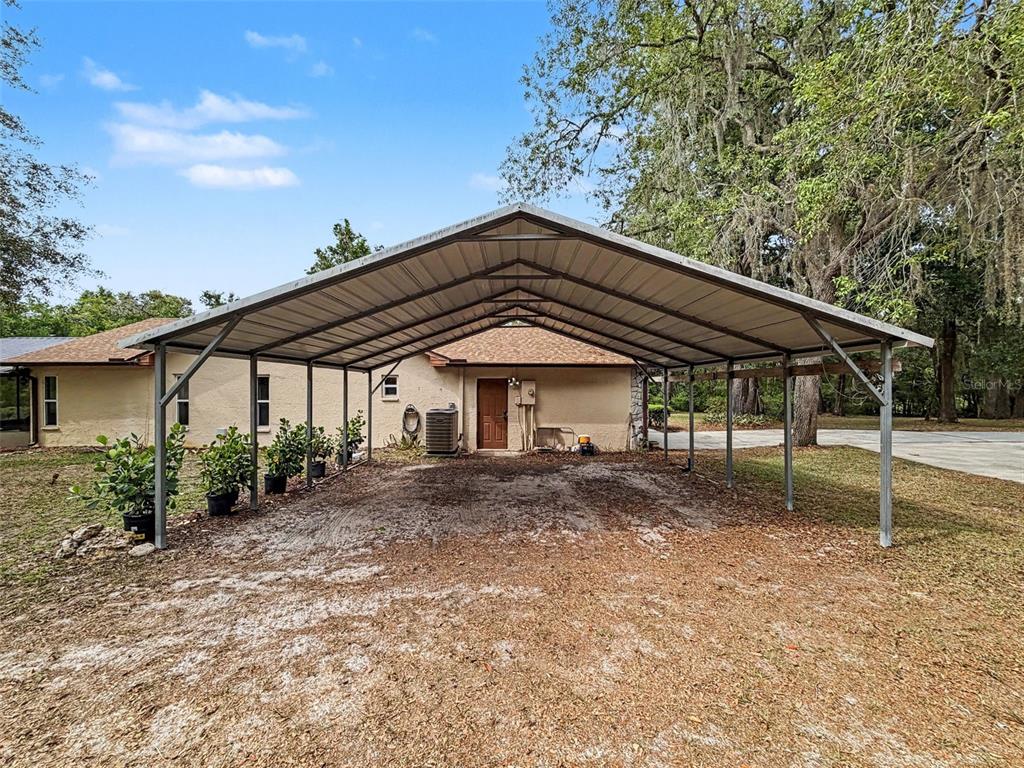 7111 Ricker Avenue Webster, FL 33597 - Photo 37 of 41 a house with a outdoor space