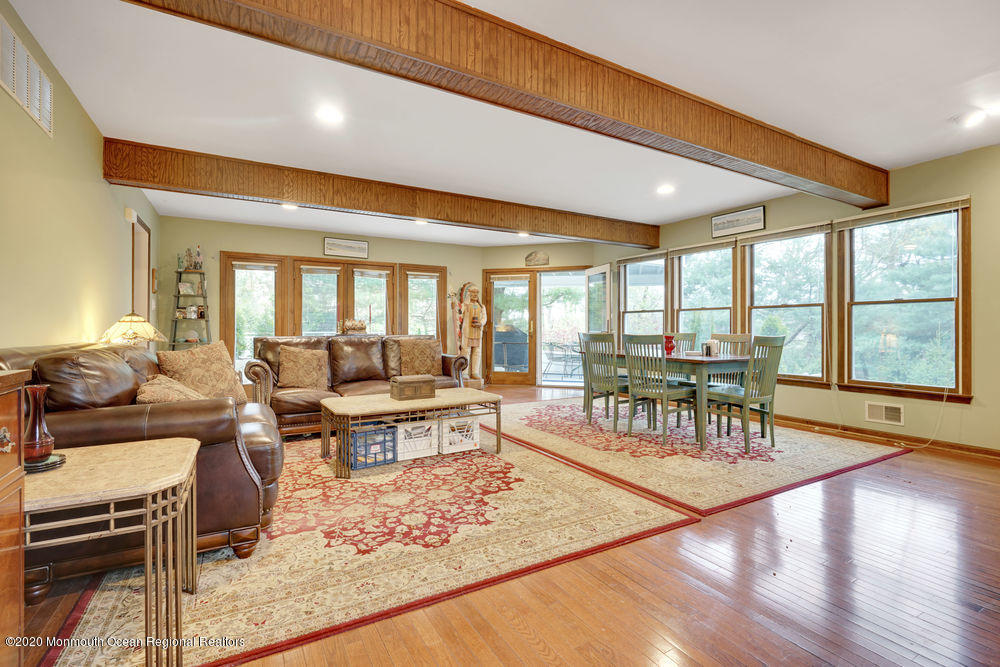 16 Woods Road West Long Branch, NJ 07764 - Photo 14 of 38 a living room with furniture and a large window