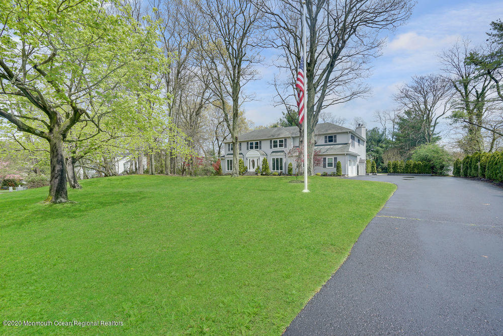 16 Woods Road West Long Branch, NJ 07764 - Photo 3 of 38 a view of a park with large trees