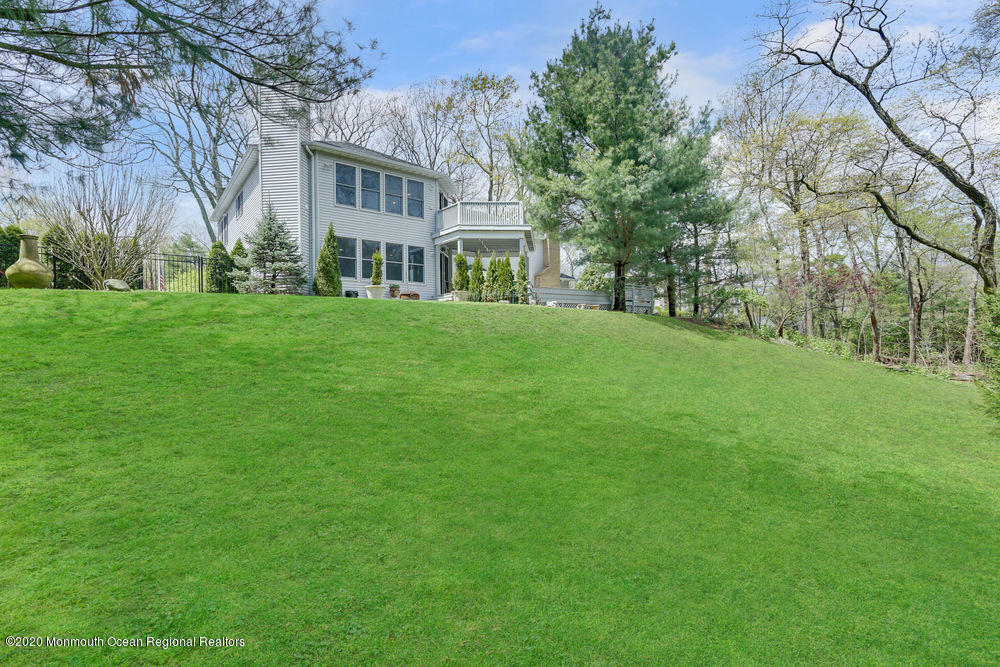 16 Woods Road West Long Branch, NJ 07764 - Photo 33 of 38 a view of a house with a big yard