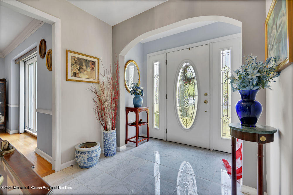 16 Woods Road West Long Branch, NJ 07764 - Photo 4 of 38 a front view of a house with garden