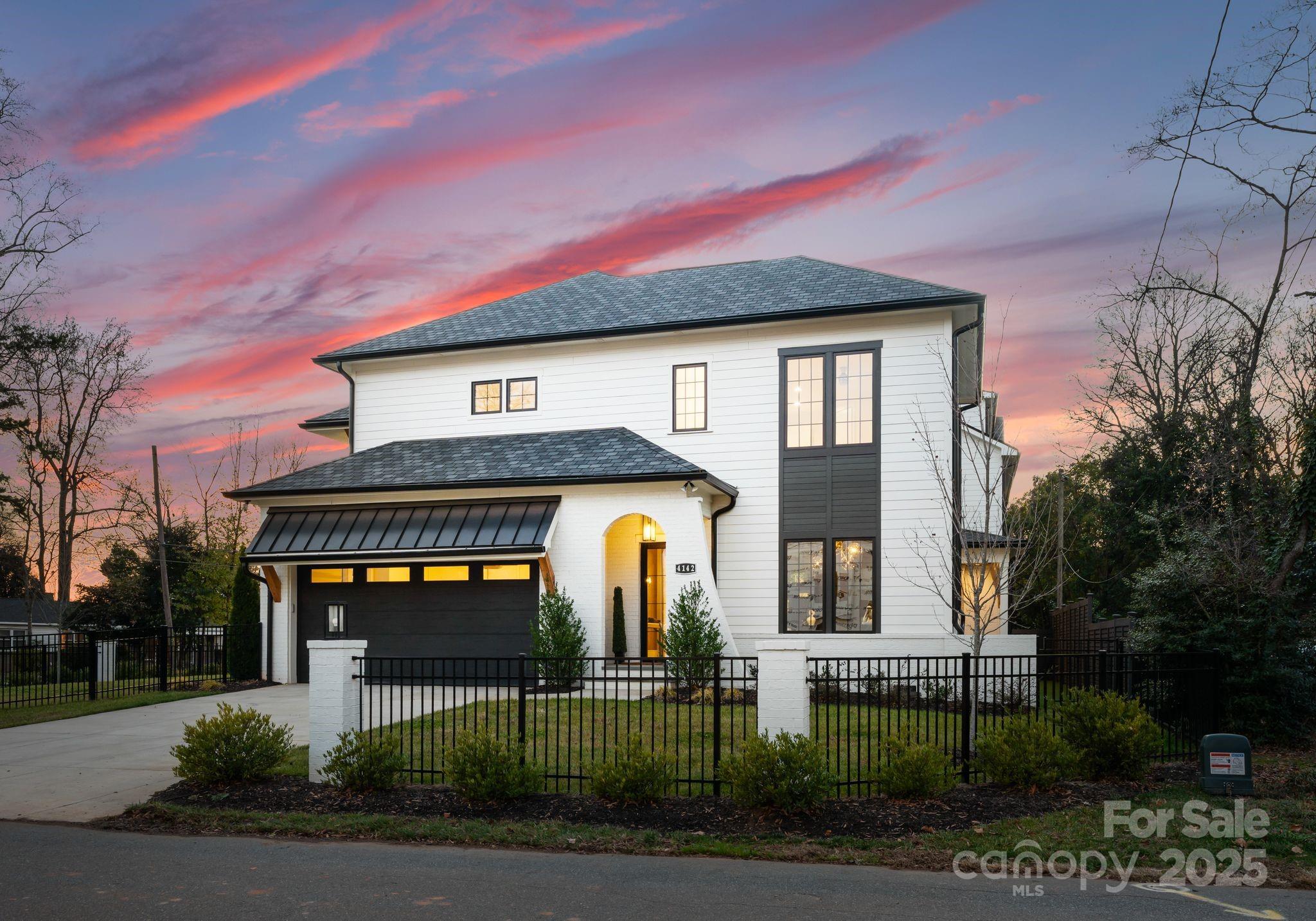 a view of a building with a small yard