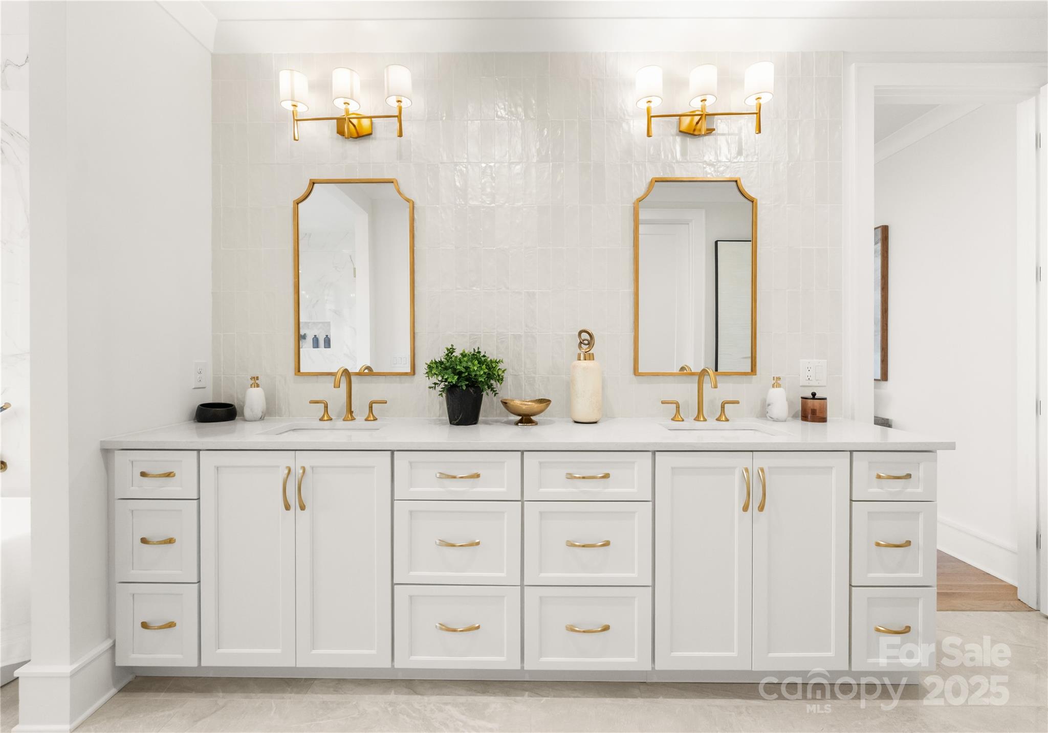 4142 Pineview Road Charlotte, NC 28211 - Photo 17 of 38 a bathroom with a sink and a mirror