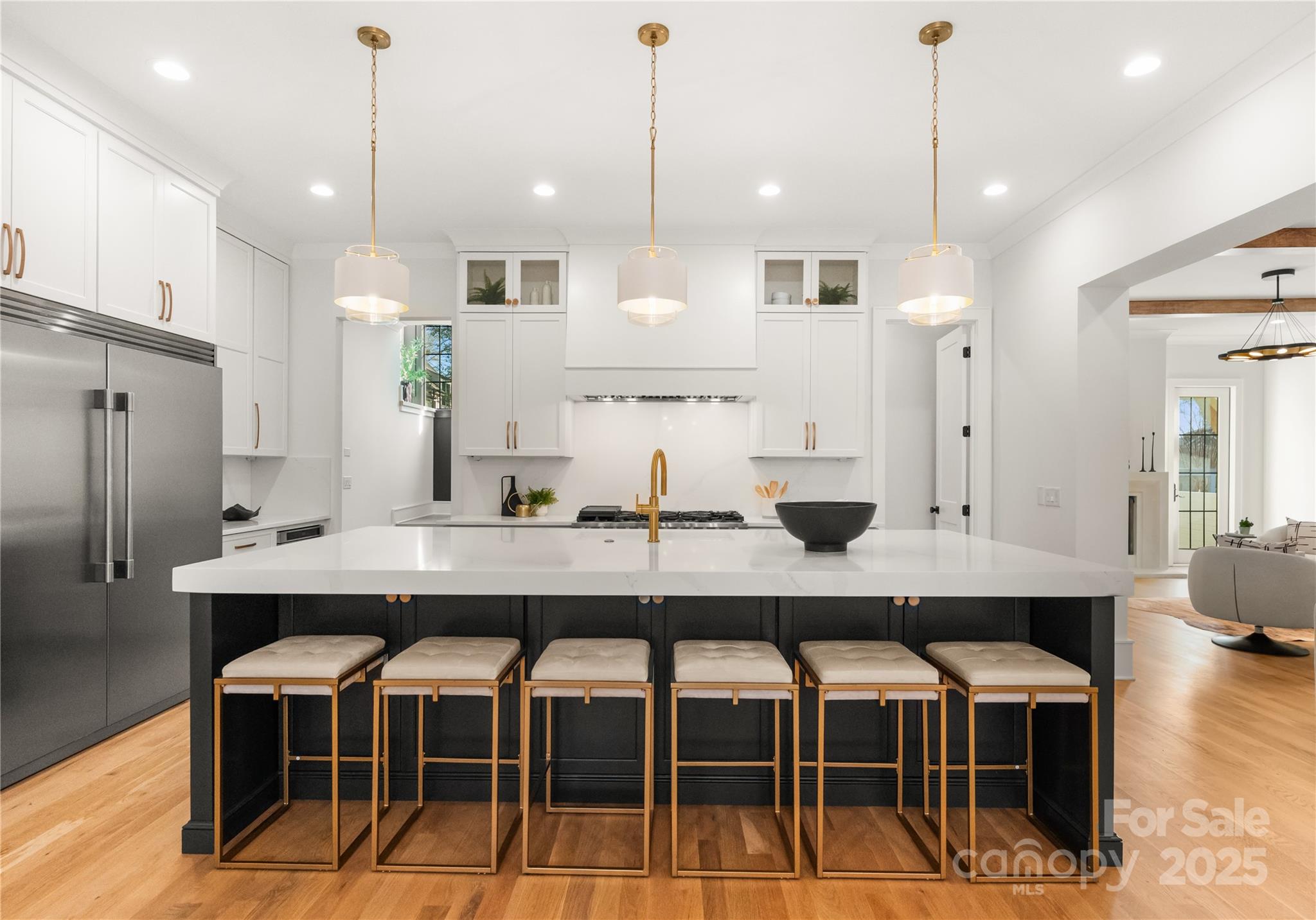 4142 Pineview Road Charlotte, NC 28211 - Photo 4 of 38 a large kitchen with a table and chairs
