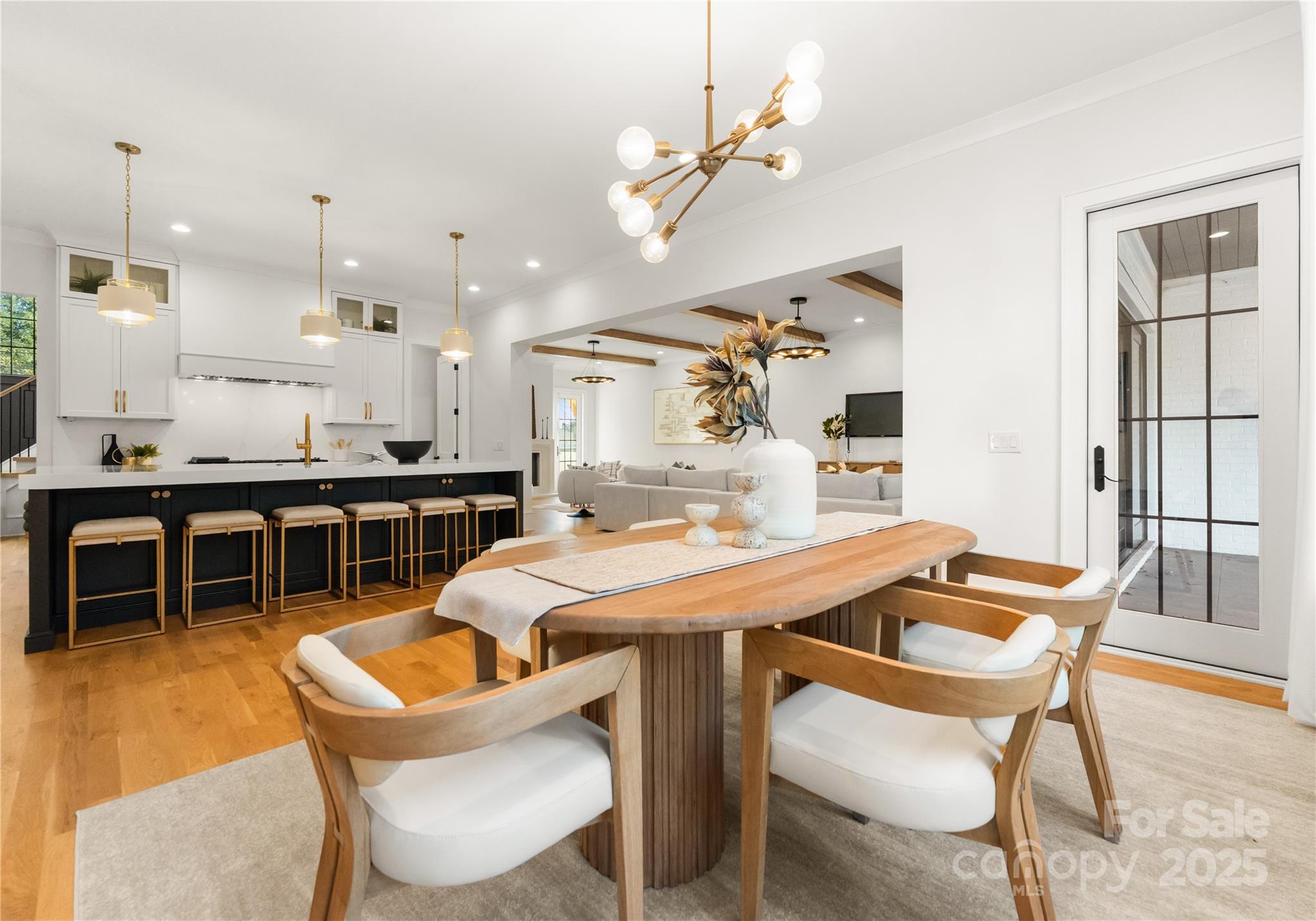 4142 Pineview Road Charlotte, NC 28211 - Photo 8 of 38 a room with a table chairs and a kitchen