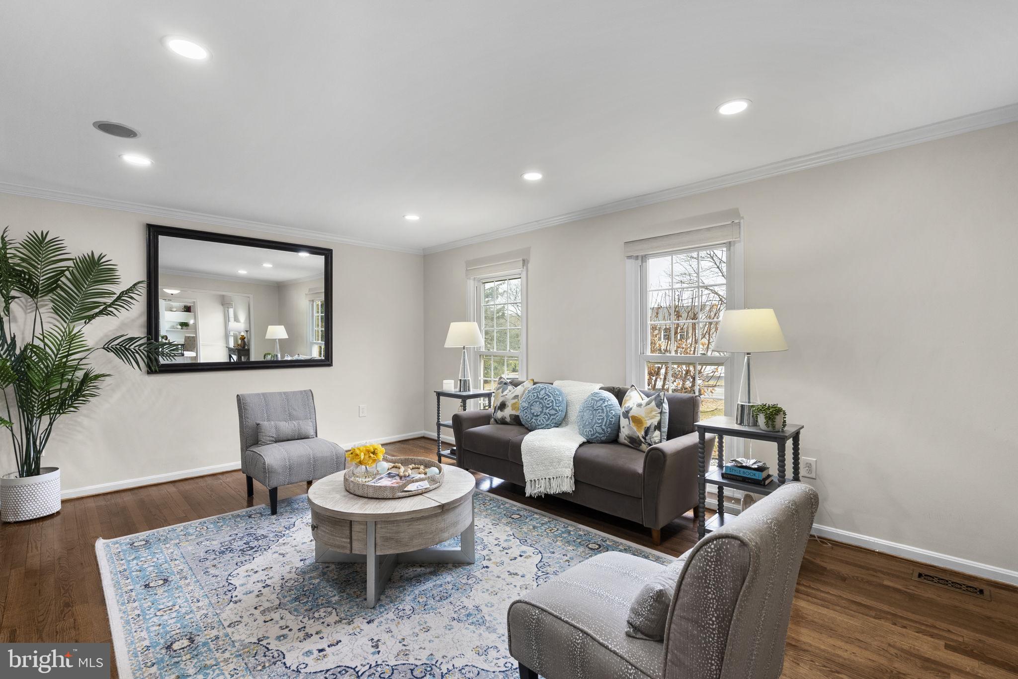 14908 Village Gate Drive Silver Spring, MD 20906 - Photo 11 of 57 a living room with furniture and a potted plant