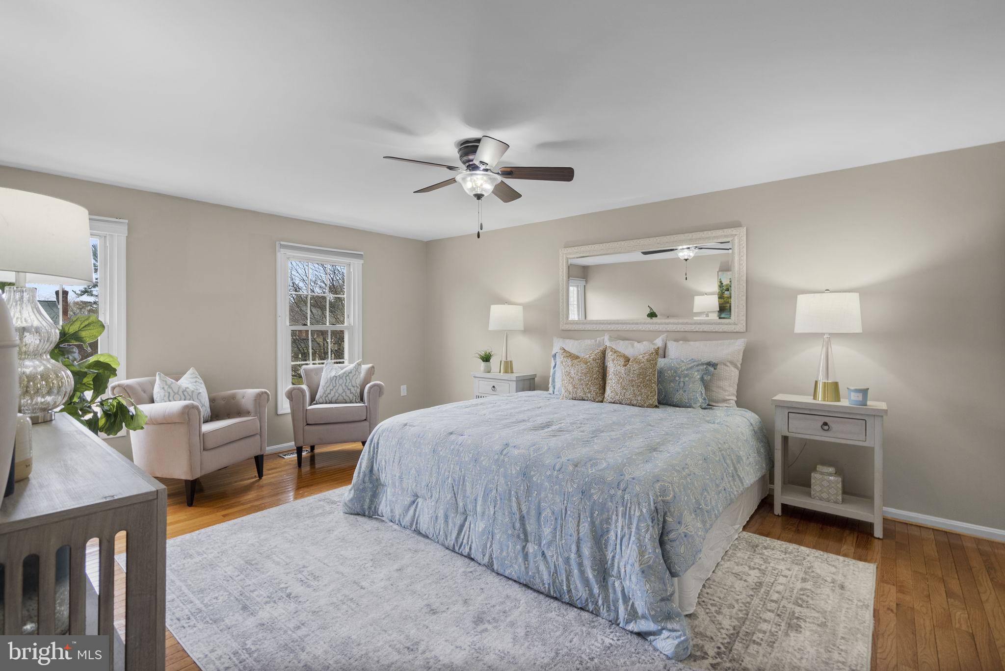 14908 Village Gate Drive Silver Spring, MD 20906 - Photo 21 of 57 a bedroom with a bed and windows