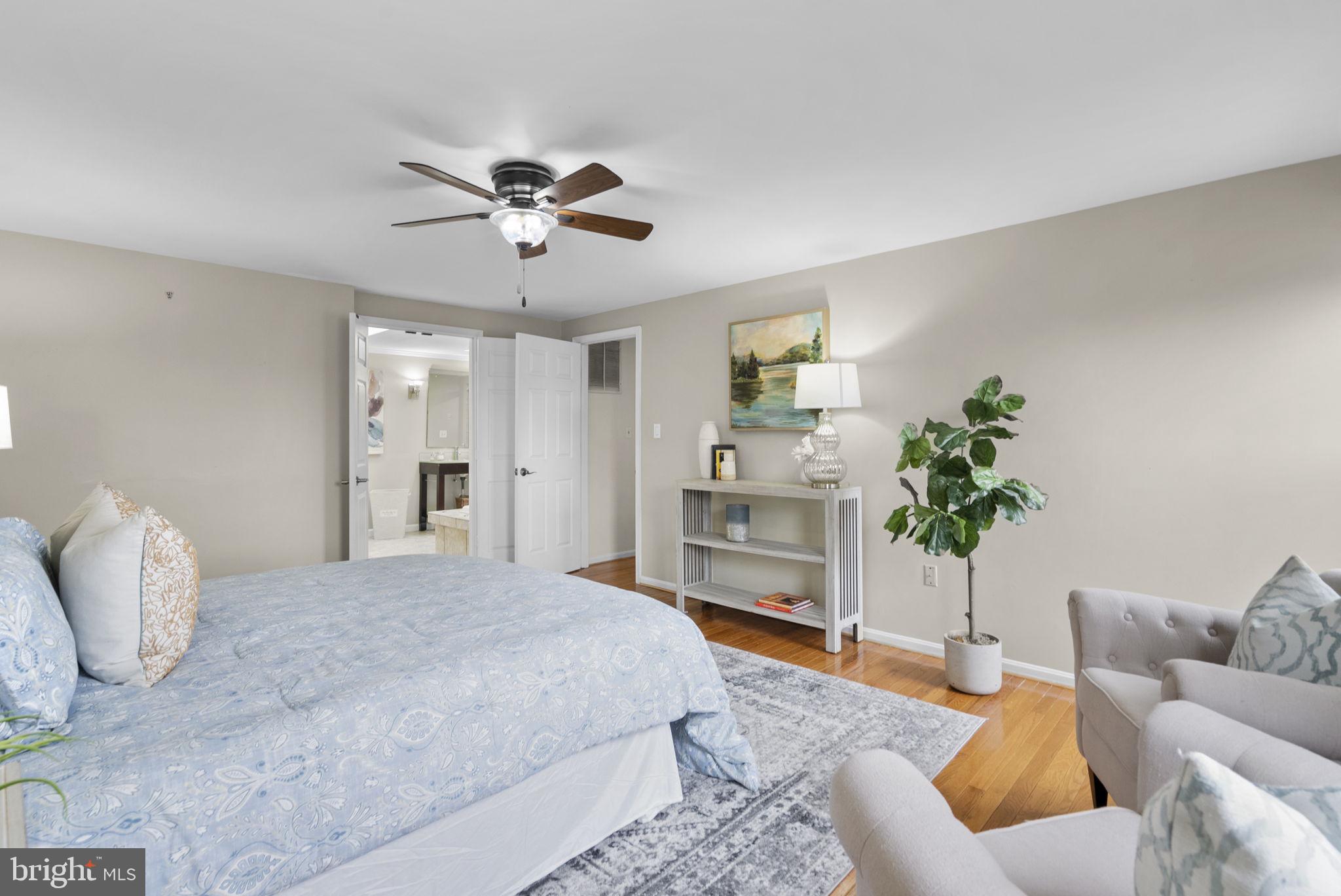14908 Village Gate Drive Silver Spring, MD 20906 - Photo 22 of 57 a living room with furniture and a fireplace