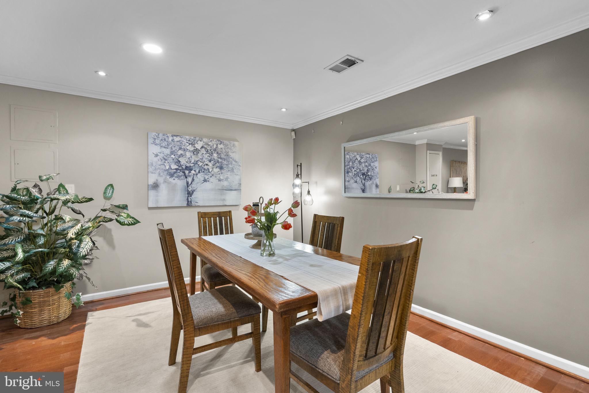 14908 Village Gate Drive Silver Spring, MD 20906 - Photo 33 of 57 a view of a dining room with furniture