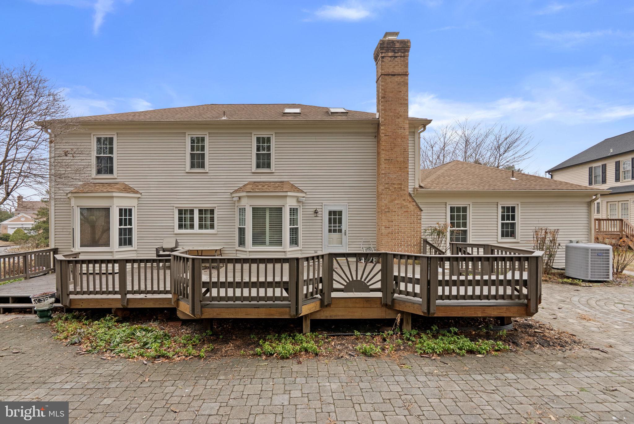 14908 Village Gate Drive Silver Spring, MD 20906 - Photo 39 of 57 a front view of a house with garden
