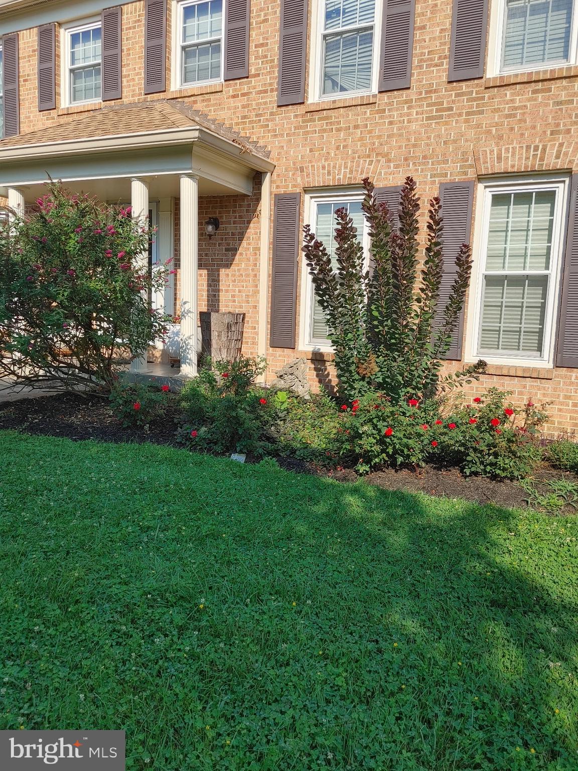 14908 Village Gate Drive Silver Spring, MD 20906 - Photo 46 of 57 front view of a house with a yard