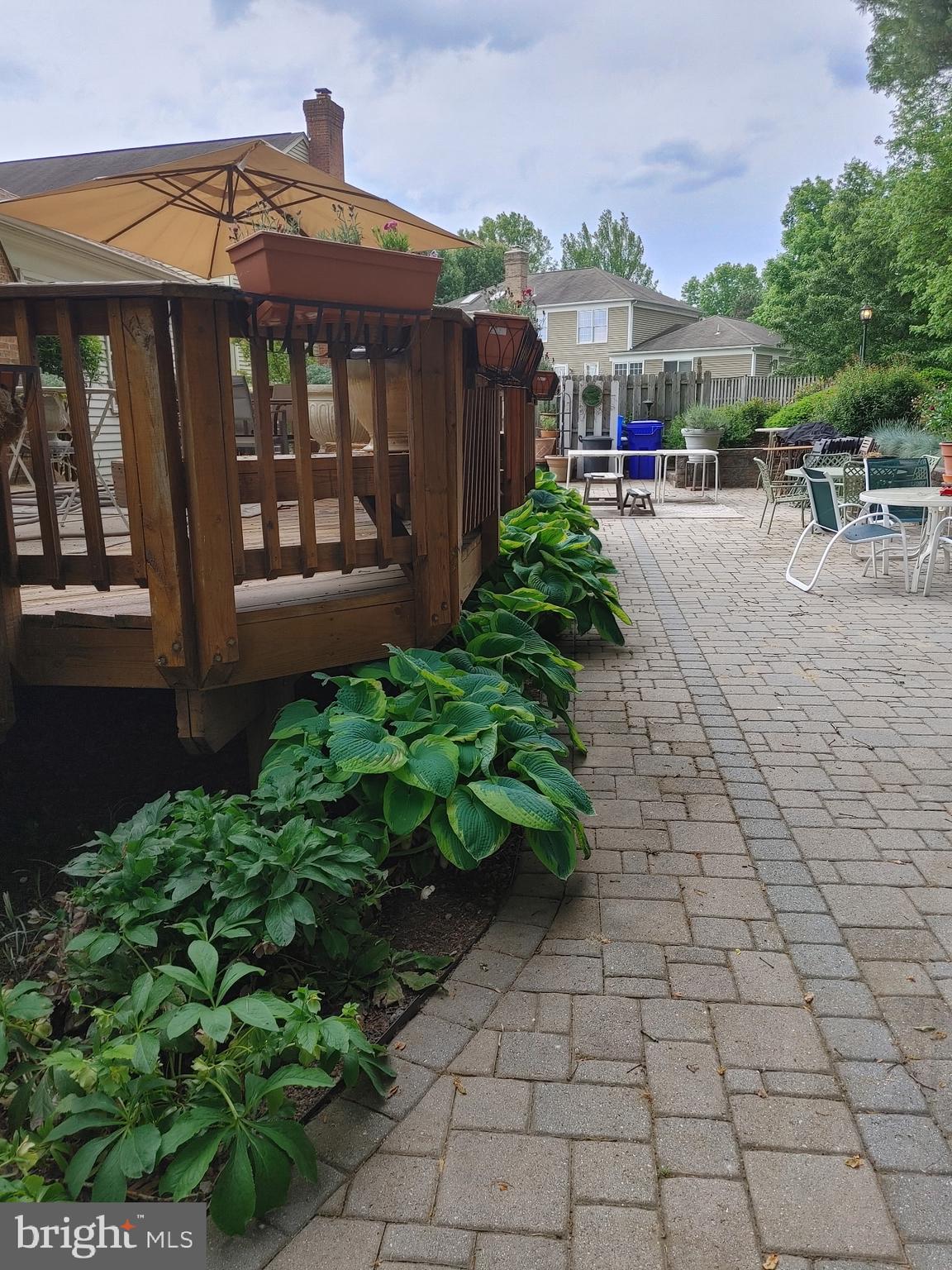 14908 Village Gate Drive Silver Spring, MD 20906 - Photo 48 of 57 a front view of a house with garden