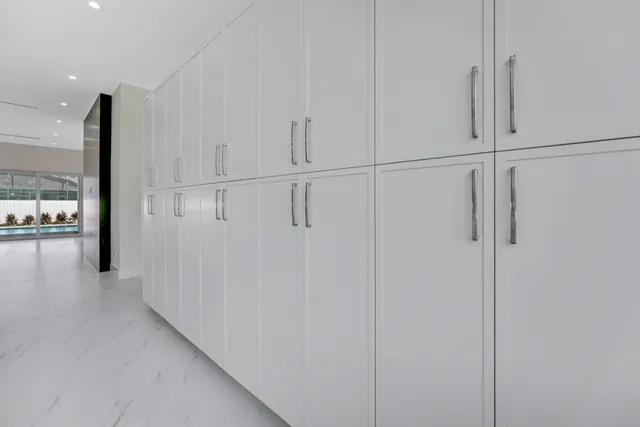 a white tub sitting next to a white toilet