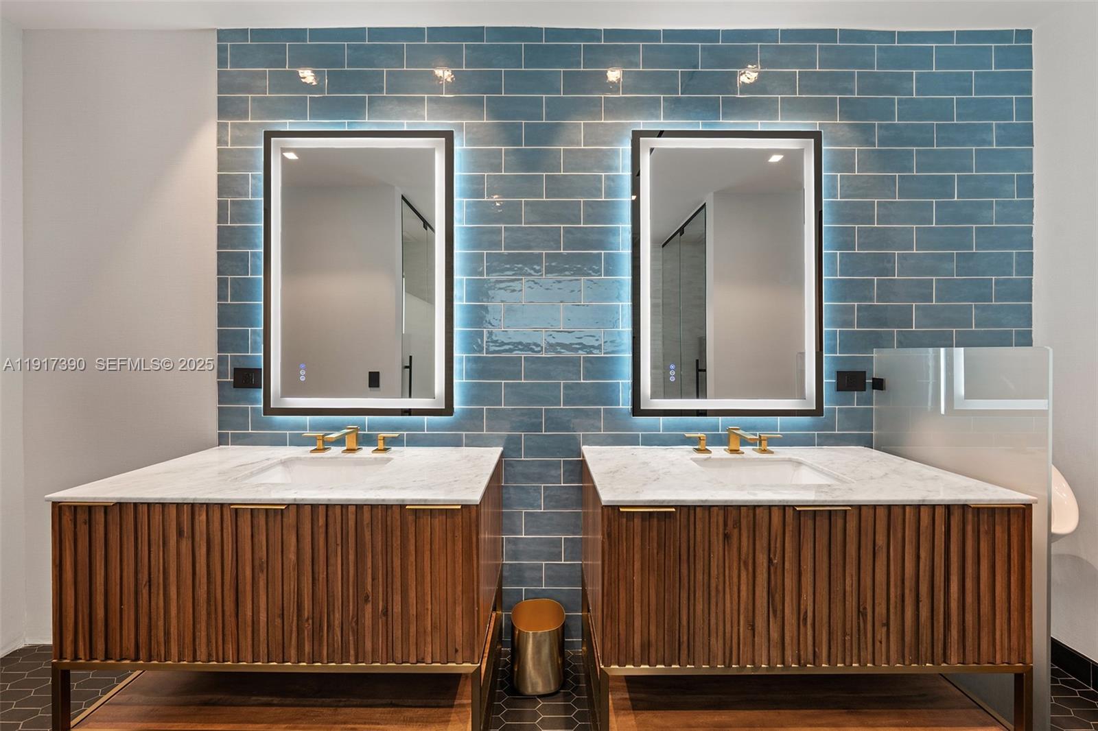 900 Washington Street Hollywood, FL 33019 - Photo 30 of 61 a bathroom with a sink and a mirror