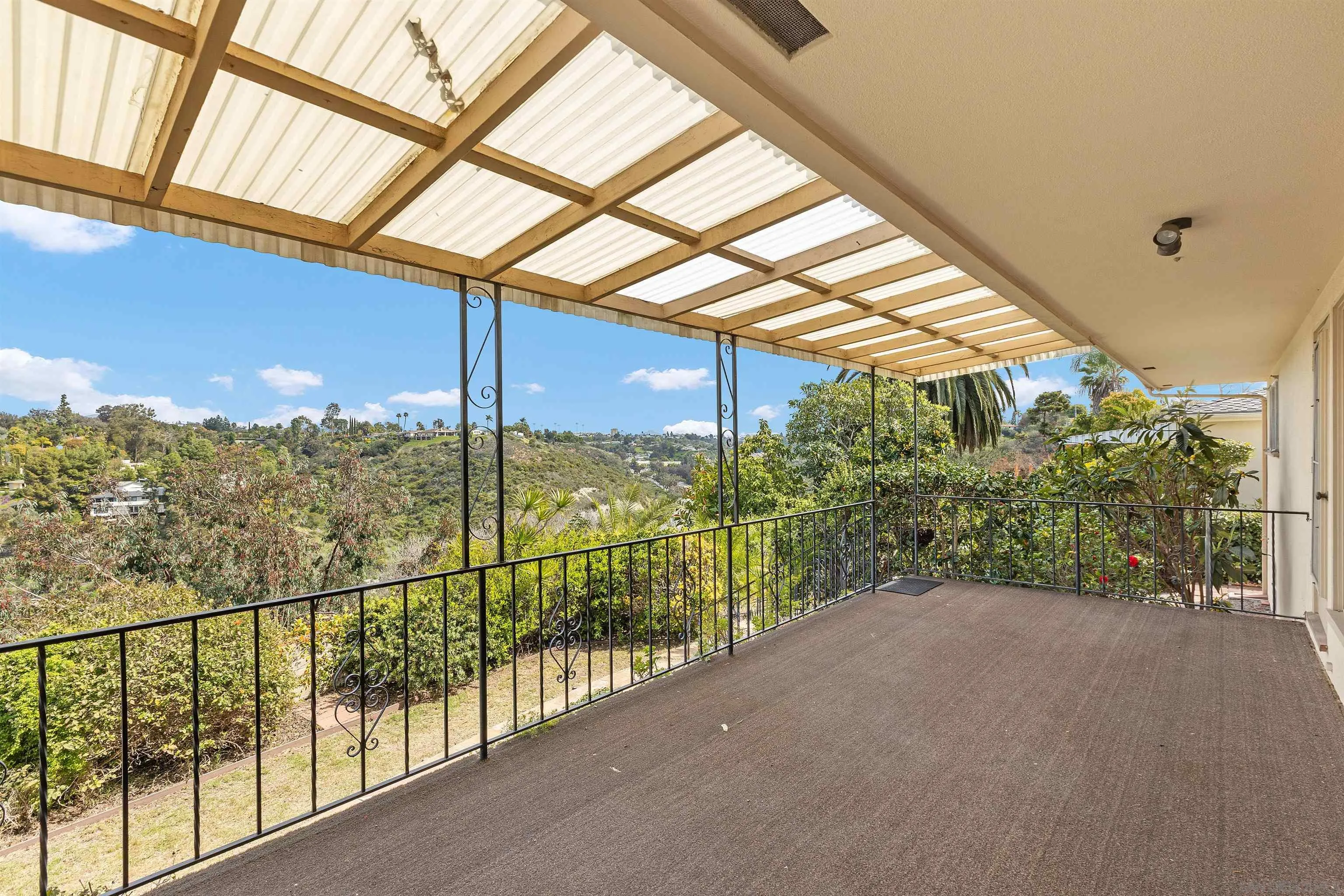 4552 Lucille Drive San Diego, CA 92115 - Photo 22 of 35 a view of a pathway of a balcony