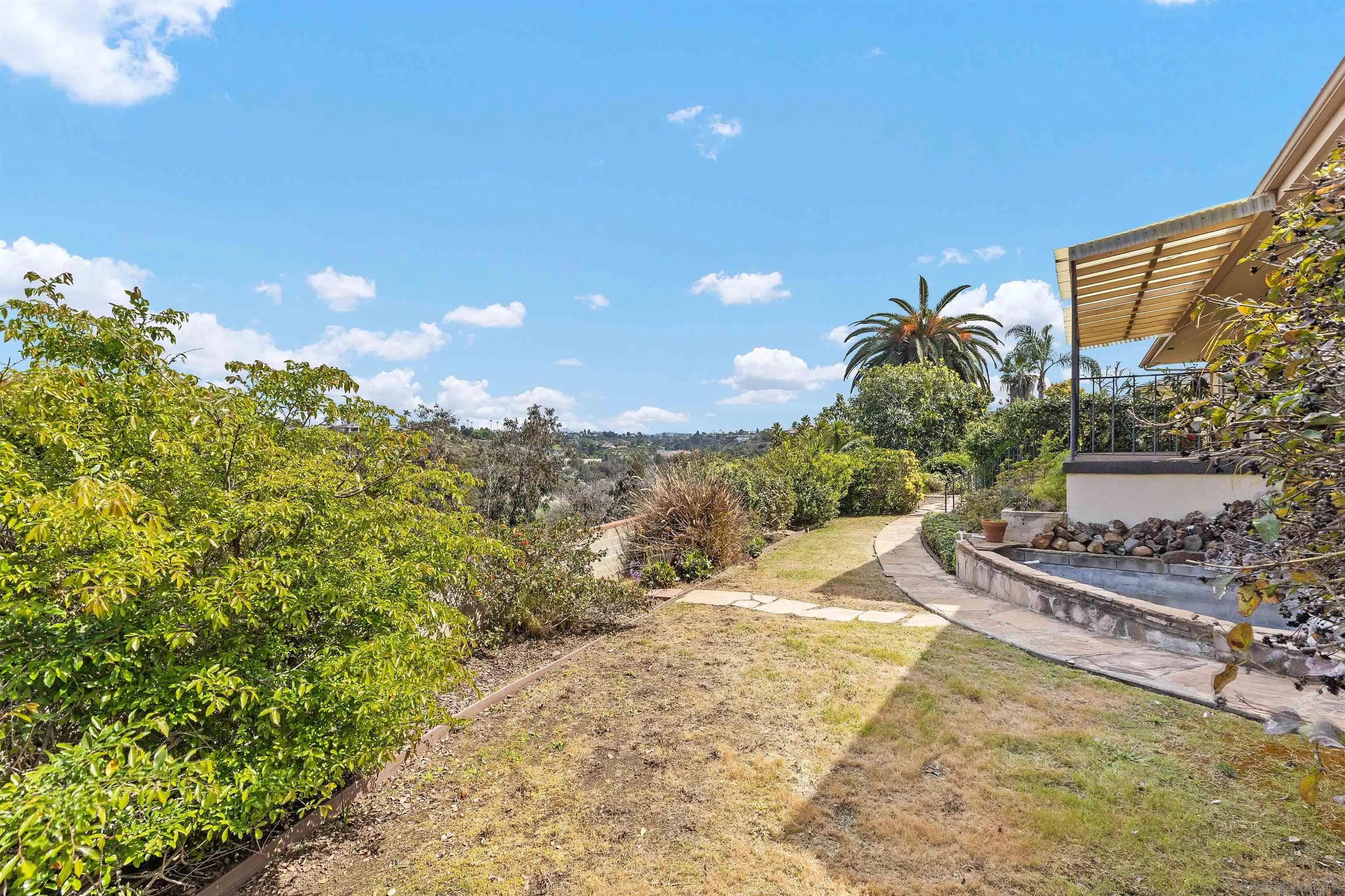 4552 Lucille Drive San Diego, CA 92115 - Photo 25 of 35 a view of a backyard of the house