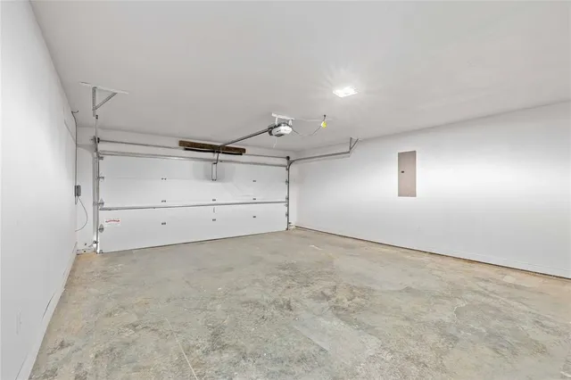 a bathroom with a toilet a sink and a mirror