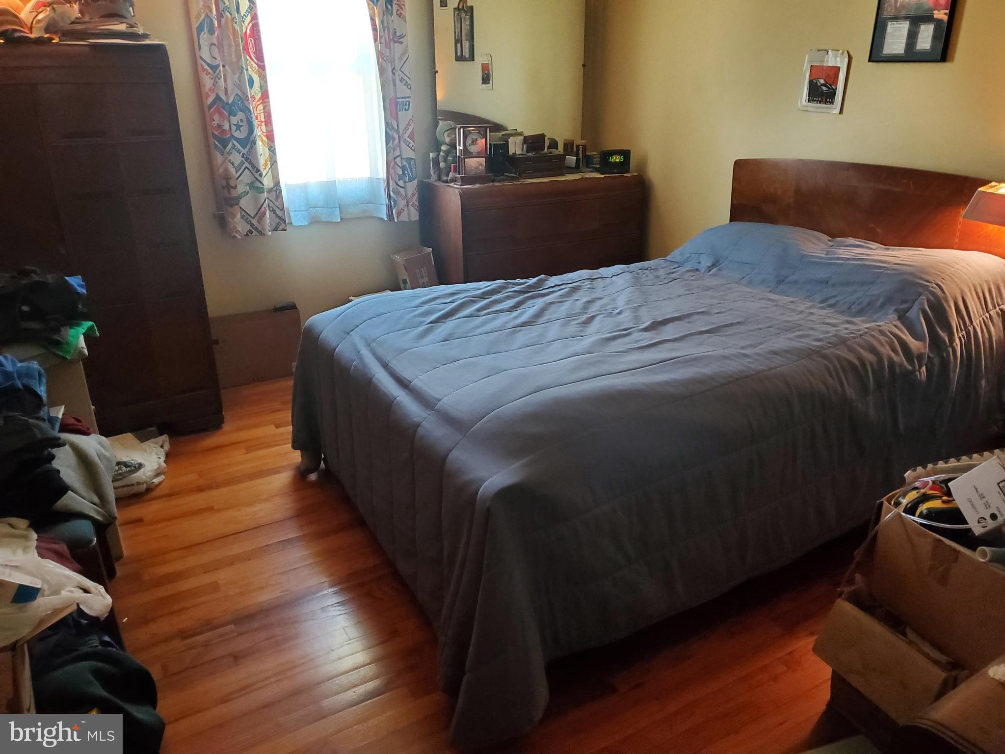 161 Pike Road Howard, PA 16841 - Photo 11 of 15 a bedroom with bed and window