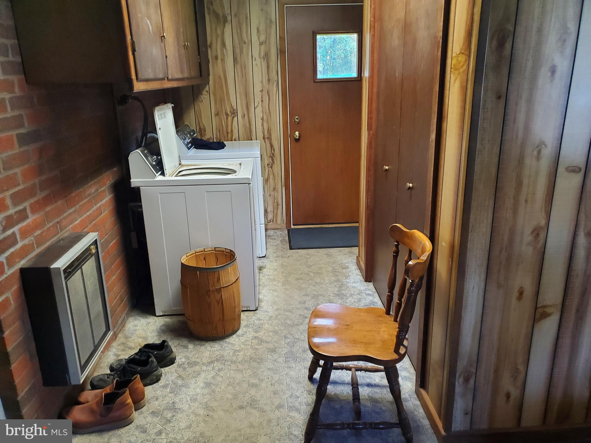 161 Pike Road Howard, PA 16841 - Photo 12 of 15 a room with chairs and a refrigerator