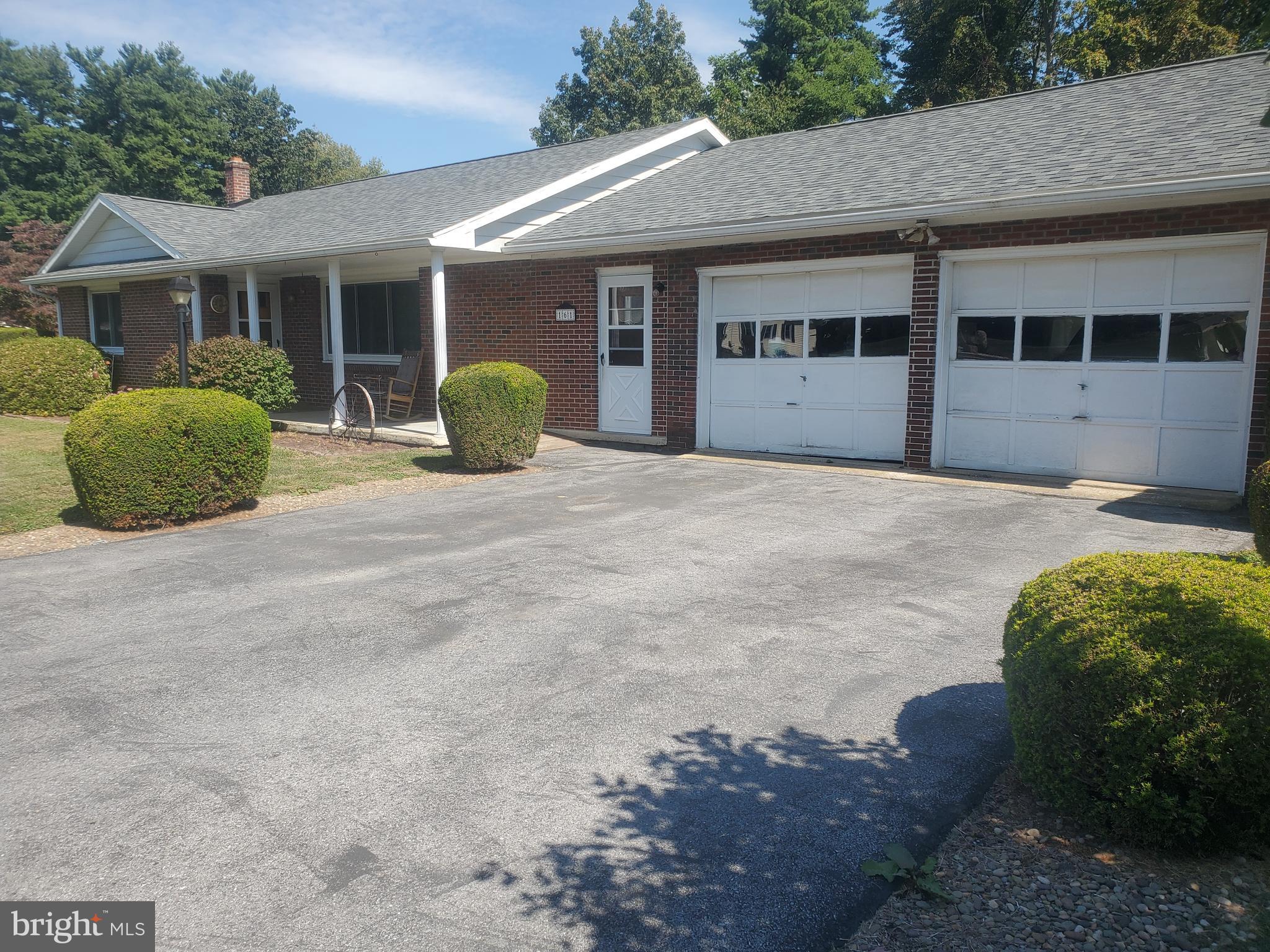 161 Pike Road Howard, PA 16841 - Photo 3 of 15 a view of a house with a backyard and windows