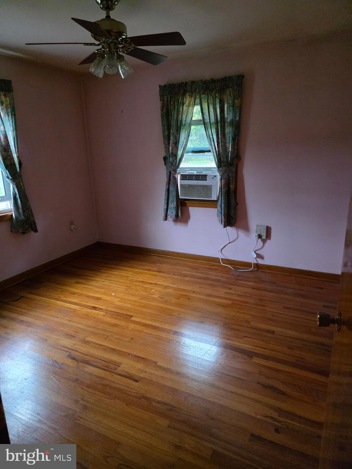 161 Pike Road Howard, PA 16841 - Photo 8 of 15 wooden floor in an empty room with a window